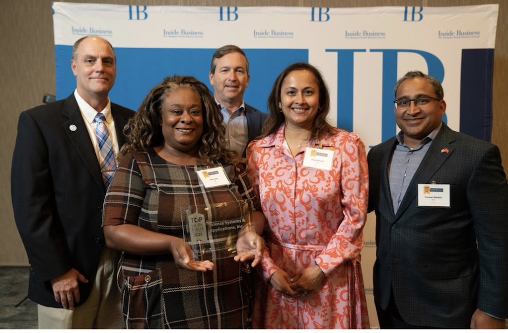 Pictured with the award (left to right): Jonathan Kelly (SSAI COO), Dee Jones (Director of HR), Keith Duffy (Assistant COO), Shilpa Bahethi, Praveen Bahethi (SSAI President).