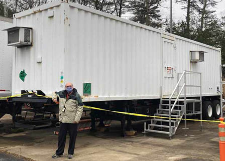 SSAI's Larry Twigg monitors the lidar trailers