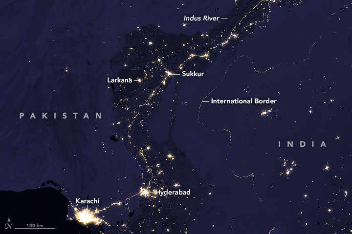 Many of the largest cities and towns in Pakistan are clustered along the Indus. The border between Pakistan and India stands out among the night lights of this region. 