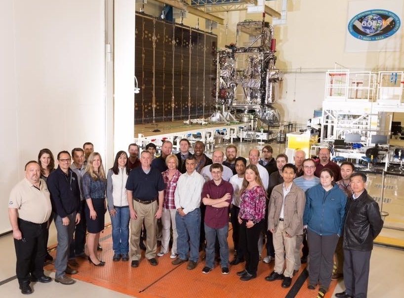 Mission Operations Support Team in front of the first satellite of the GOES-R series circa 2016